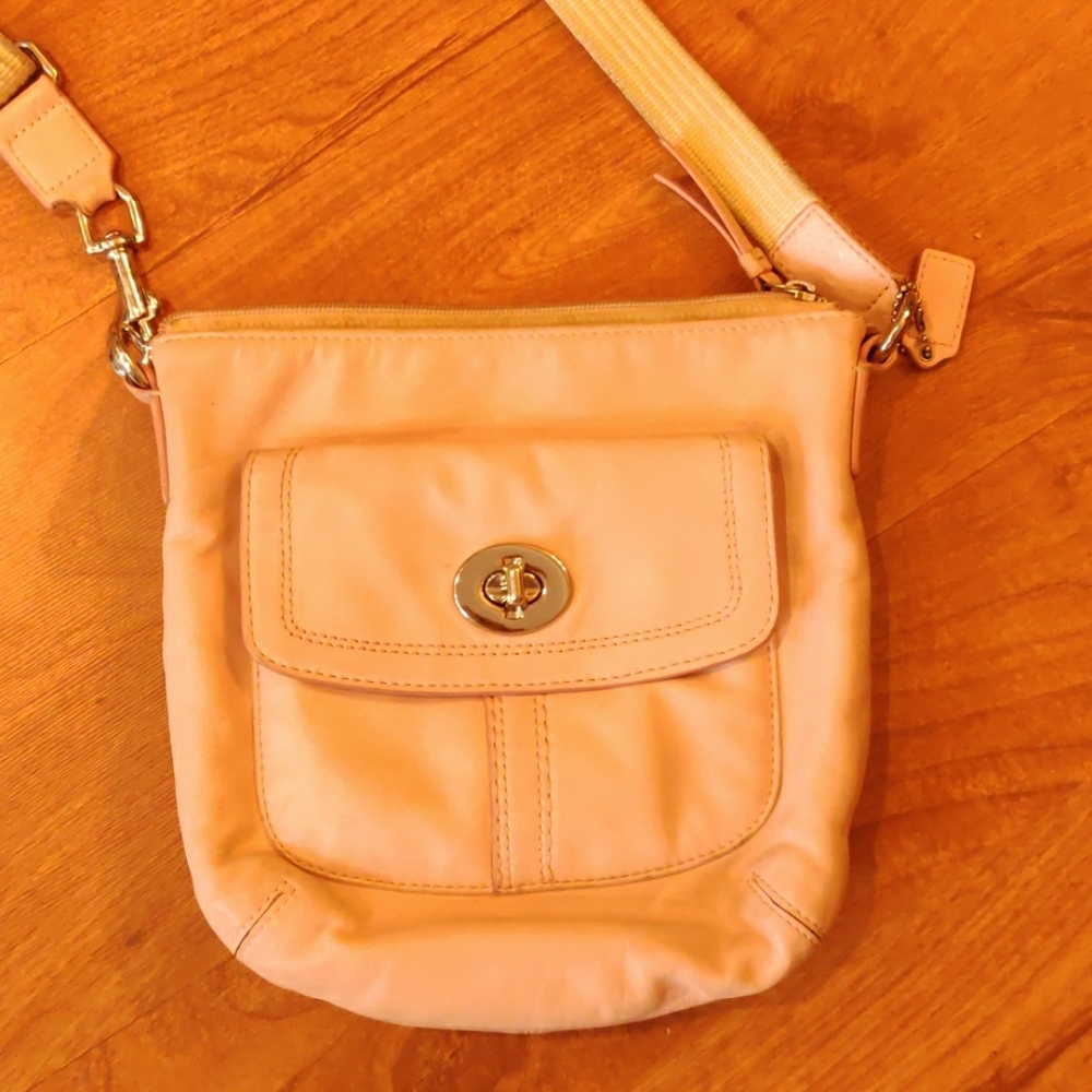 Light pink leather coach purse